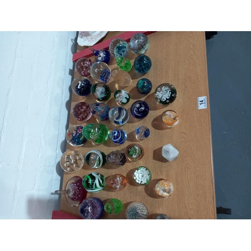 14 - A collection of paperweights