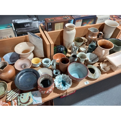 30 - A good collection of studio pottery both signed and unsigned pieces