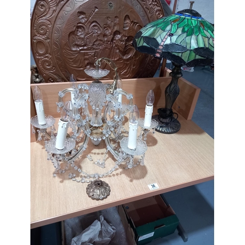 36 - A Tiffany style table lamp and a crystal 6 branch chandelier