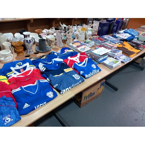 58 - Cardiff City football items - football shirts, signed autobiographies etc