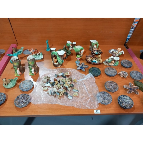 73 - A collection of Wade whimsies, other Wade pieces and collectible vases