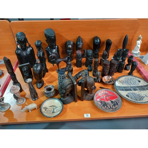 74 - Carved wooden african figures and other african art