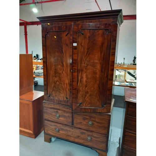 106 - A Victorian mahogany inlaid linen press