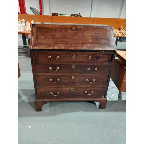 110 - A Victorian mahogany bureau on bracket feet