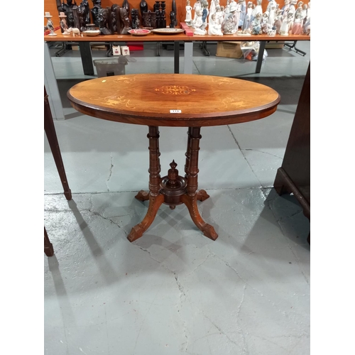 114 - A mahogany inlaid occasional table