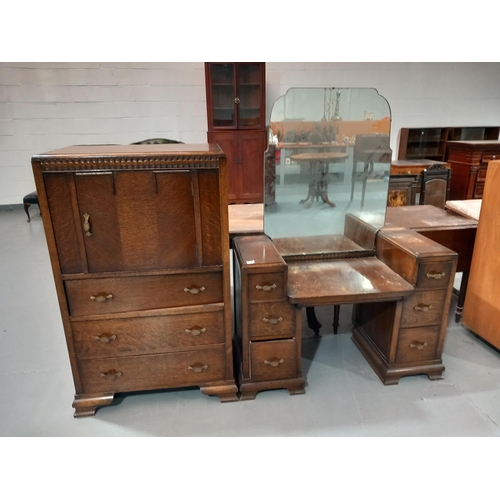 116 - An oak tallboy and an oak dressing table with mirror