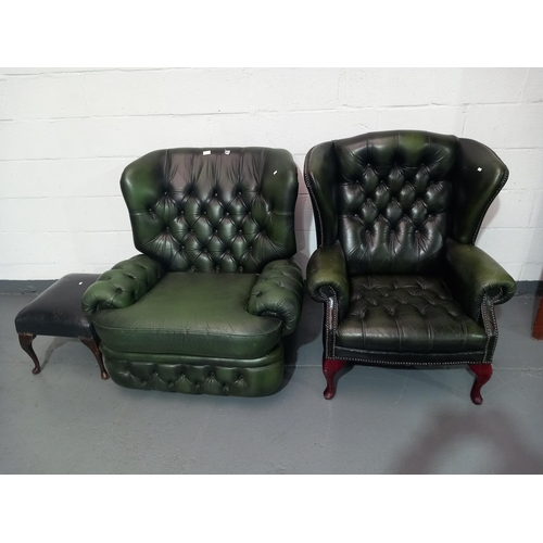 143 - Two green leather armchairs and stool