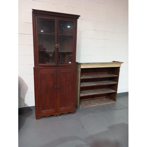 144 - A pine corner cabinet and a painted pine bookcase