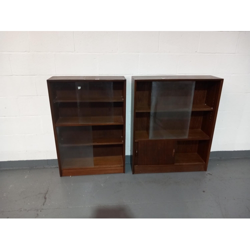 145 - Two Gibbs glass fronted bookcases