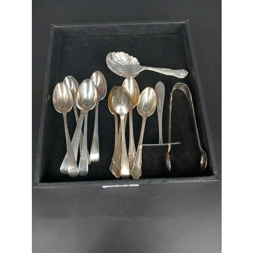 221 - Two sets of hallmarked silver teaspoons, a caddy spoon and other silver cutlery (weight 190 grams)