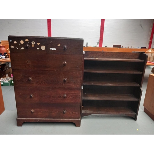 104 - An oak two over four chest of drawers and an oak bookcase