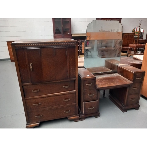 116 - An oak tallboy and an oak dressing table with mirror