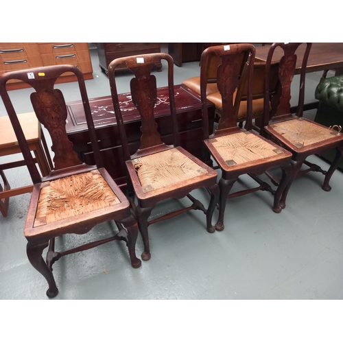 133 - Four inlaid rush seated dining chairs