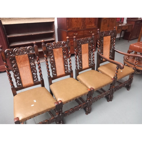 139 - Four oak frame dining chairs to include one carver