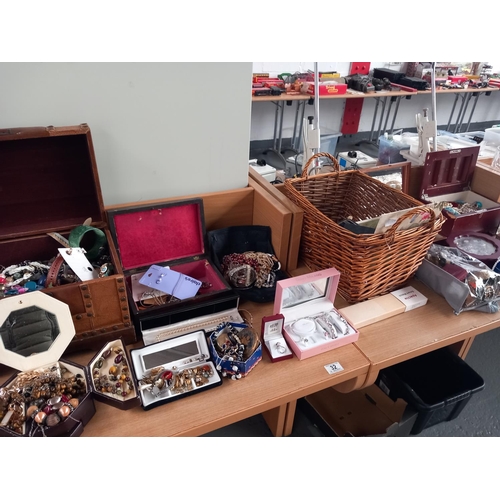 32 - A large collection of costume jewellery and jewellery boxes