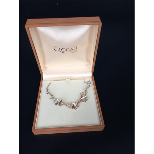 209 - A Clogau silver pendant and combined chain