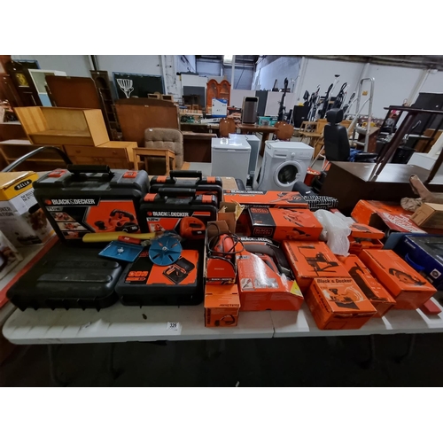 326 - A quantity of Black and Decker tools (some cased) to include 750w 2mm planer, 18v drill, mouse sande... 