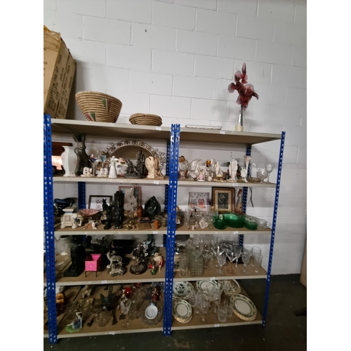 473 - Ten shelves of mixed ornaments, china, glassware, etc