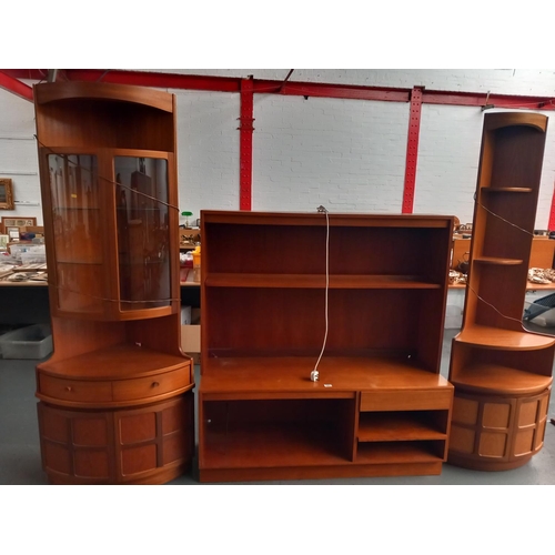 101 - Two teak corner cabinets and a teak display cabinet