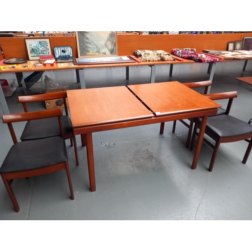 103 - A teak extending White and Newton dining table and four chairs