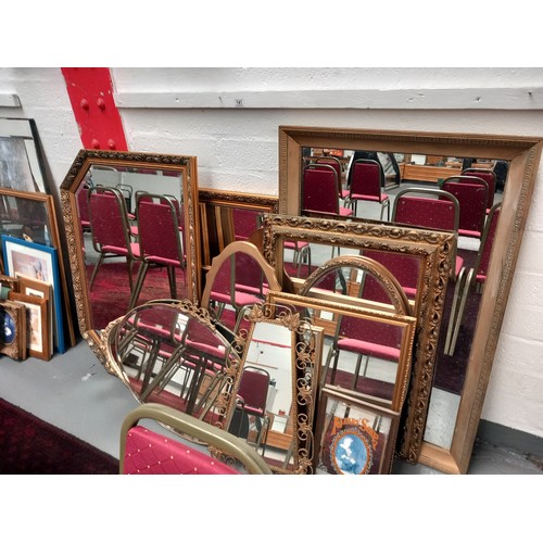 141 - A selection of framed mirrors