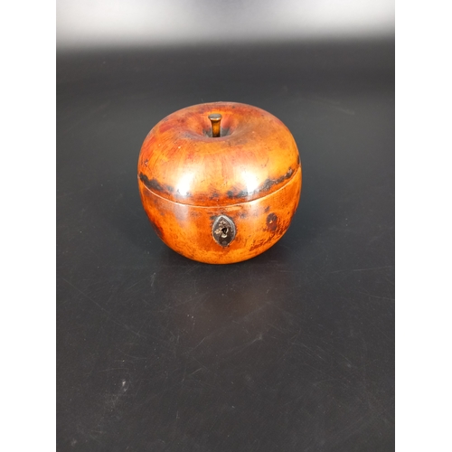 200 - A Georgian Fruitwood Tea Caddy modelled as an apple with hinged lid with stalk and metal escutcheon ... 