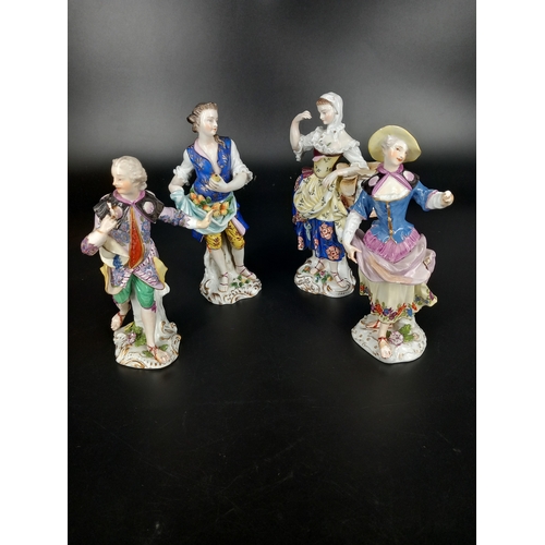 201 - Four early hand painted figurines (no makers marks) Seamstress and a Fruit picker (no obvious damage... 