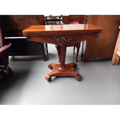 118 - A rosewood card table on a single pedestal base