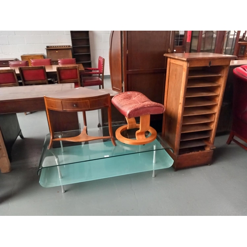 120 - An oak filing cabinet with tambour door (needs attention), footstool, glass coffee table and a corne... 