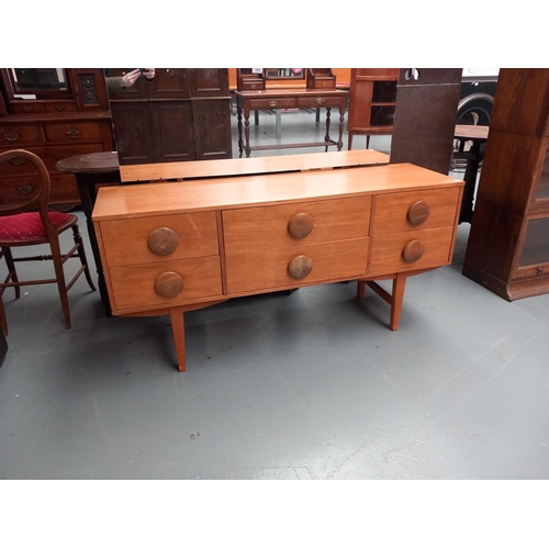 123 - A mid century teak dressing table