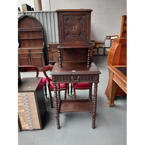 127 - An early oak carved bureau desk