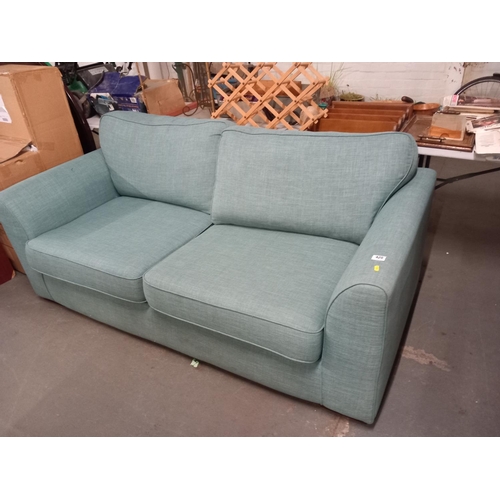 420 - A teal 2 seater fabric sofa