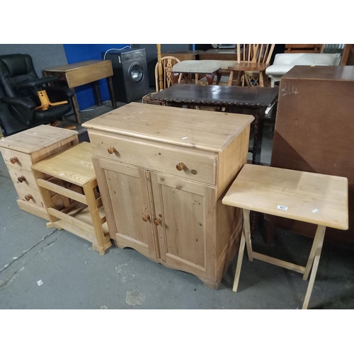 427 - A pine cabinet, a pine 3 drawer bedside cabinet, a pine effect folding table, etc