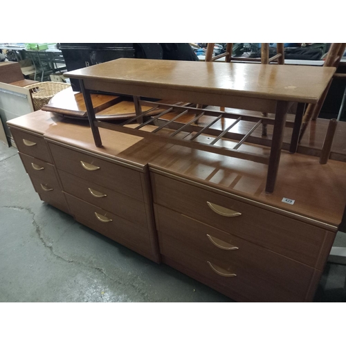 429 - A teak coffee table and 3 x three drawer chests of drawers