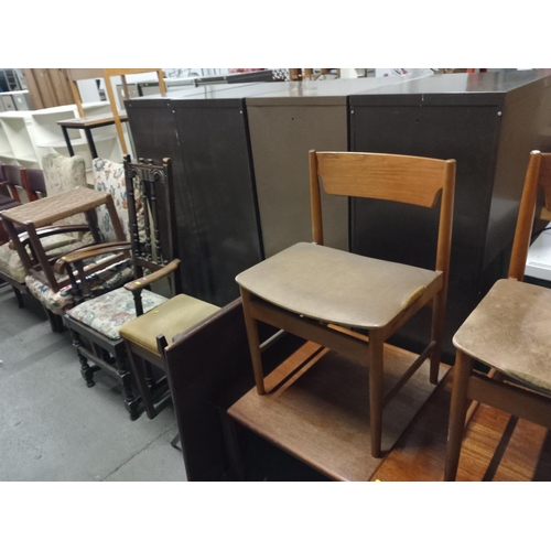 343 - 2 teak chairs, teak stool, teak coffee table, 2 upholstered arm chairs and an oak carver etc