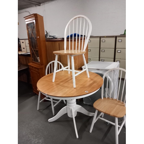 363 - A pine and white circular table and three chairs and a corner cabinet