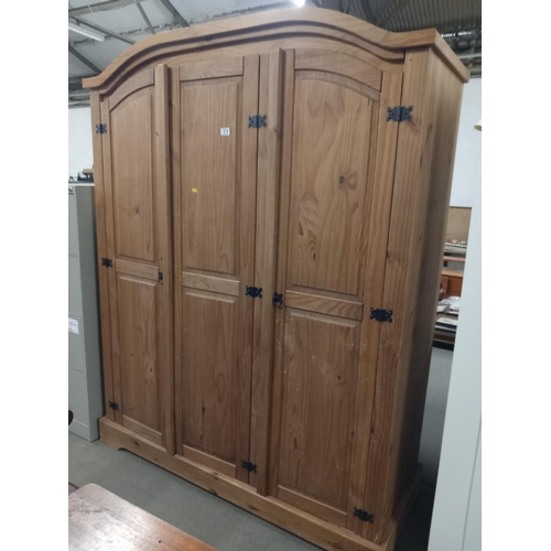 374 - A pine triple wardrobe