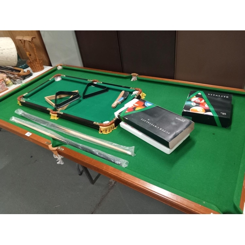 396 - One large and one small snooker tables including balls, cues, etc