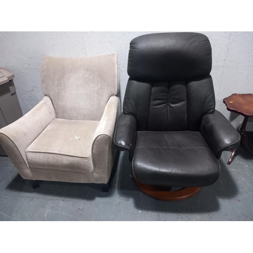 471 - A fabric armchair and a leatherette swivel armchair