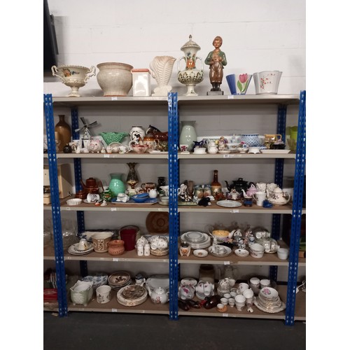 497 - 10 shelves of ornaments, part tea sets, figurines etc