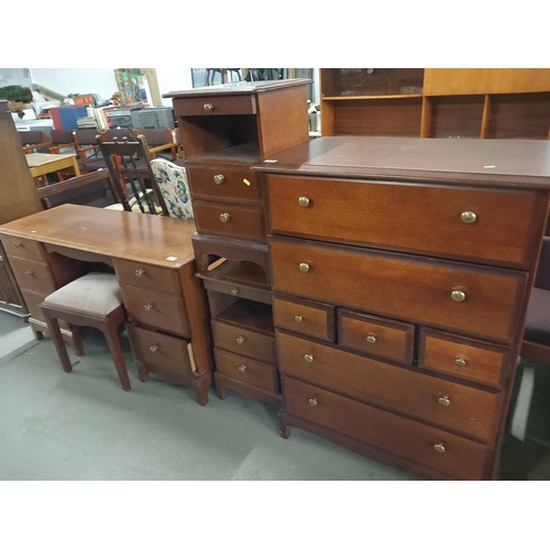 378 - Stag furniture to include chest of drawers, bedside cabinets and a desk