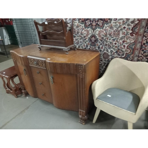 380 - An oak sideboard, Lloyd Loom style chair, nest of tables, etc