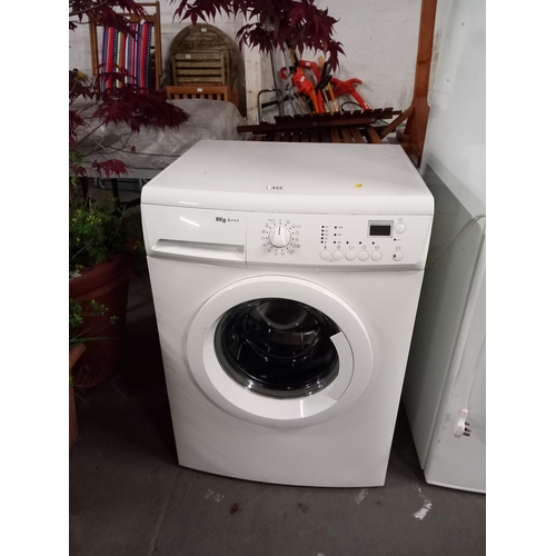 433 - An 8 kilogram washing machine