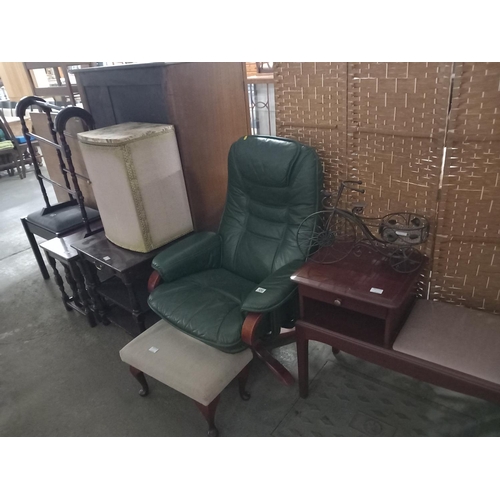 450 - A green leather swivel chair, mahogany telephone table, massive tables stool etc