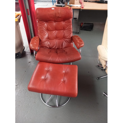 100 - A brown leather Ekornes reclining swivel armchair with stool