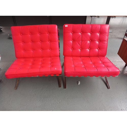 103 - Two red leather chrome frame Barcelona style chairs