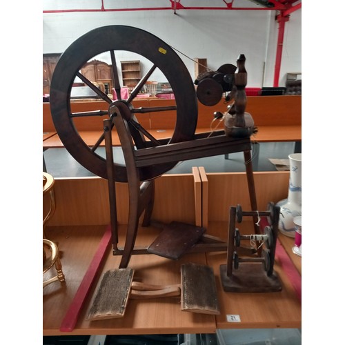 21 - A functioning vintage spinning wheel with lazy Kate and carding combs