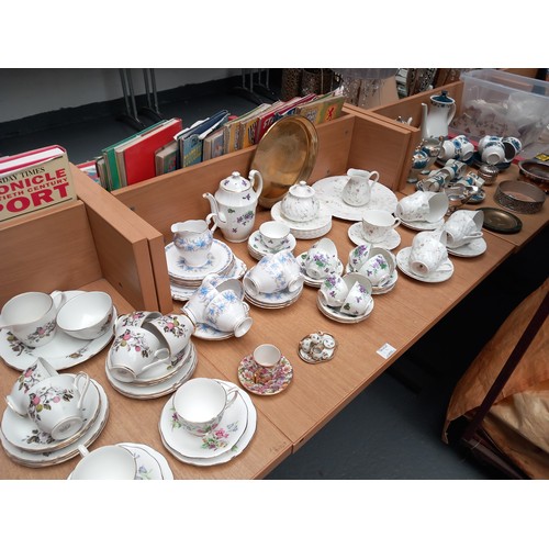 38 - A collection of part tea services to include Wedgwood, Adderley, Tuscan and metalware including bras... 
