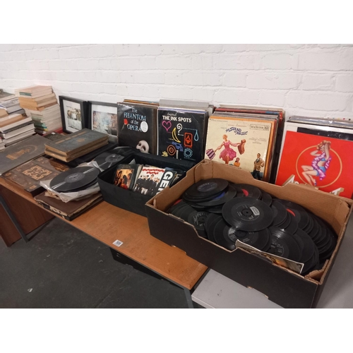 508 - A collection of mixed genre vinyl records, leather bound books etc