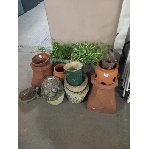 683 - A collection of garden planters and ornaments